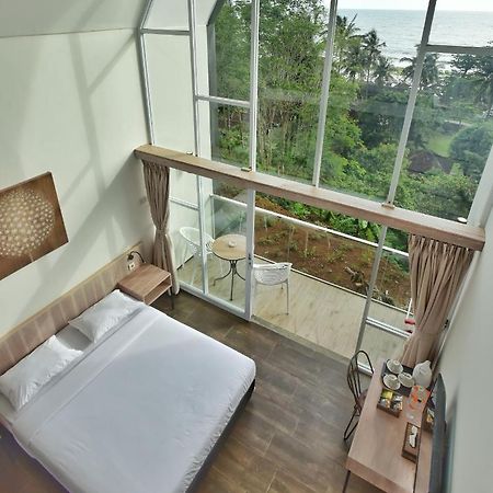 Negla Beach Villa Godog Bagian luar foto