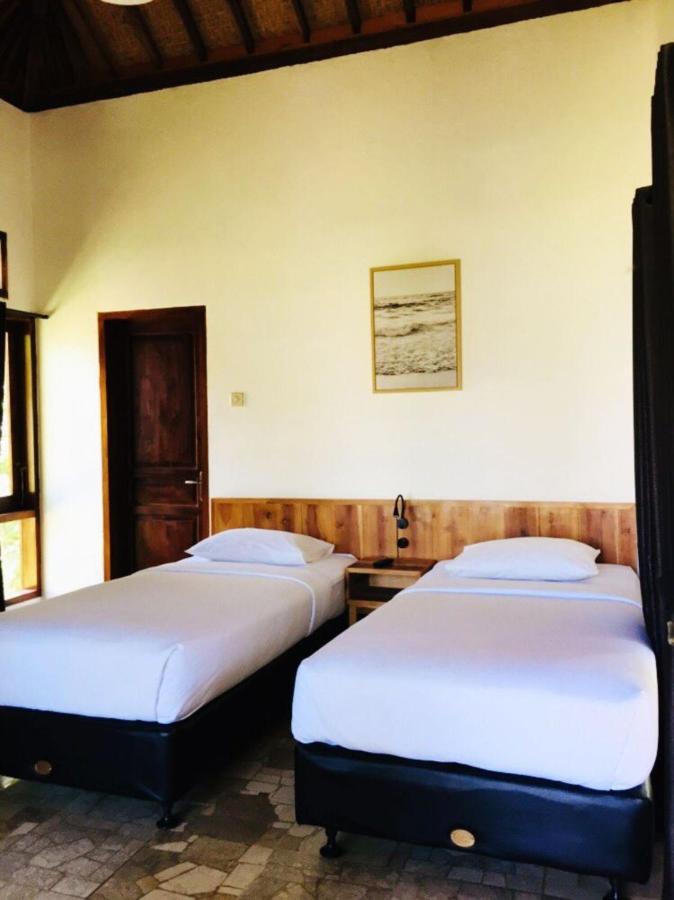 Negla Beach Villa Godog Bagian luar foto