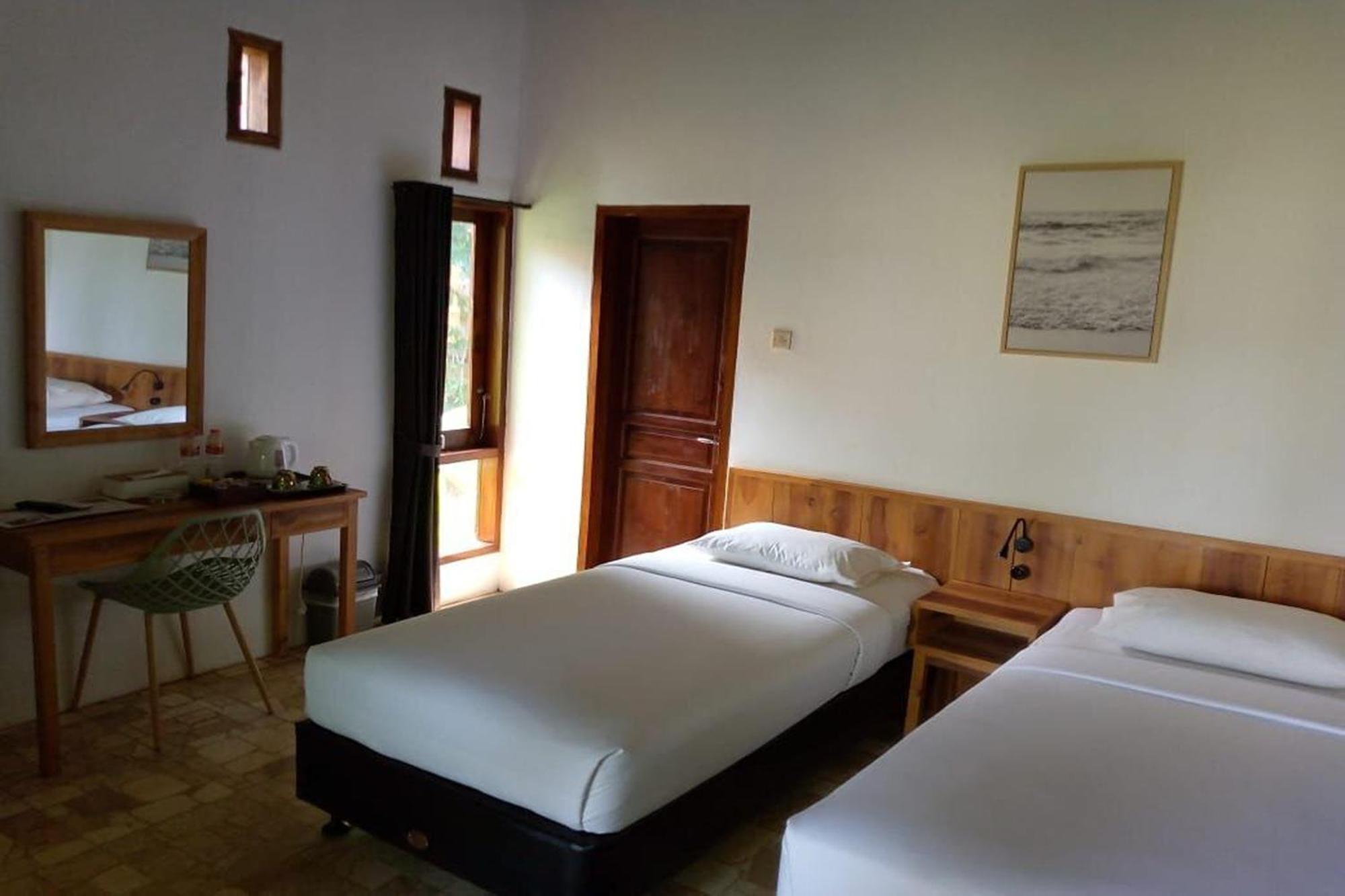 Negla Beach Villa Godog Bagian luar foto